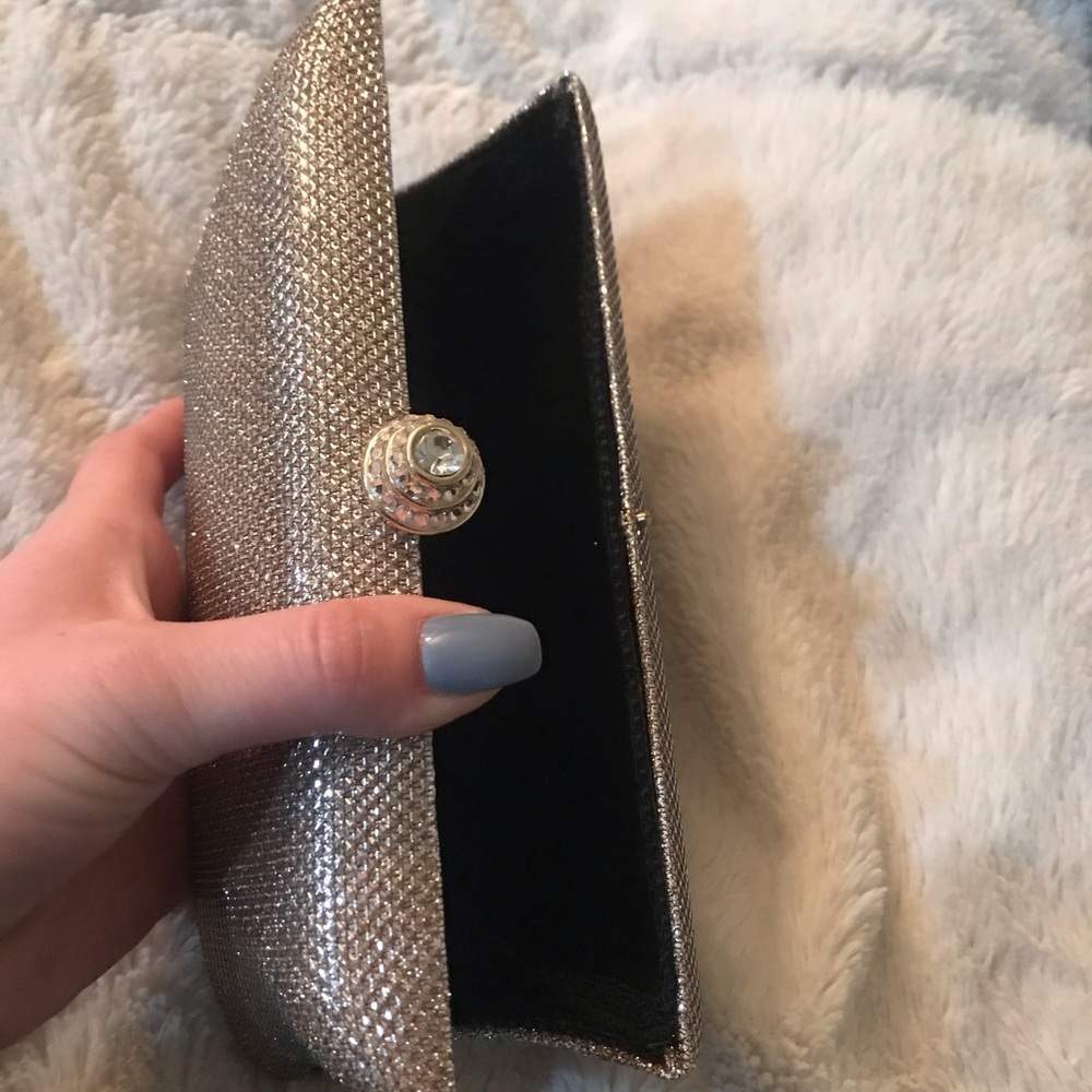 Champagne colored bedazzled clutch